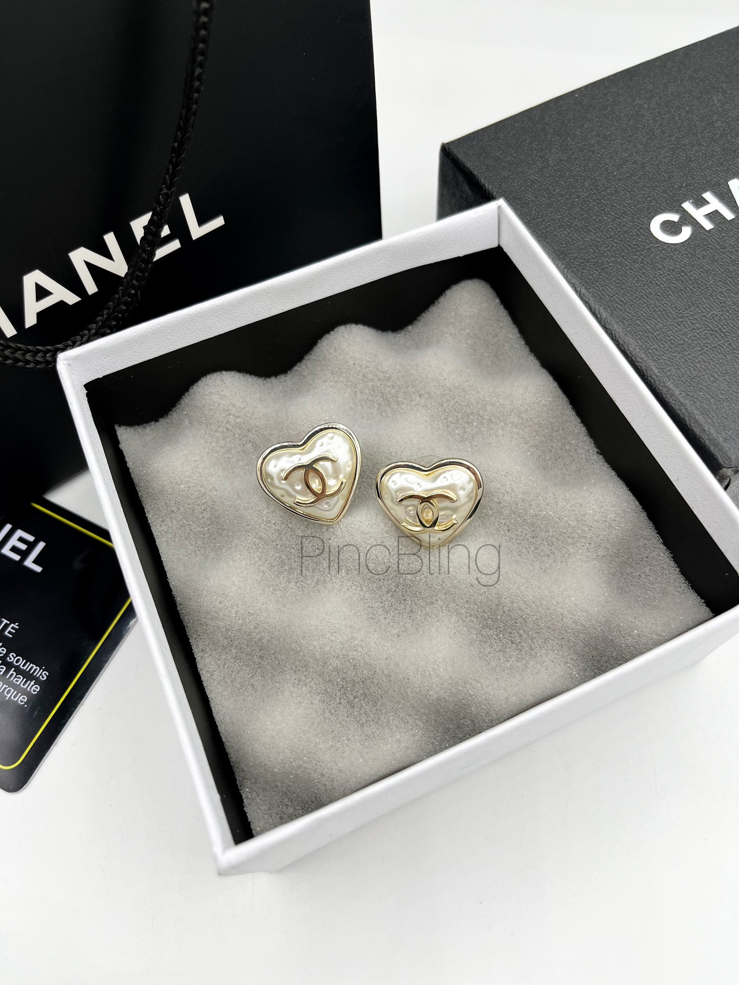 Heart branded earrings chnl