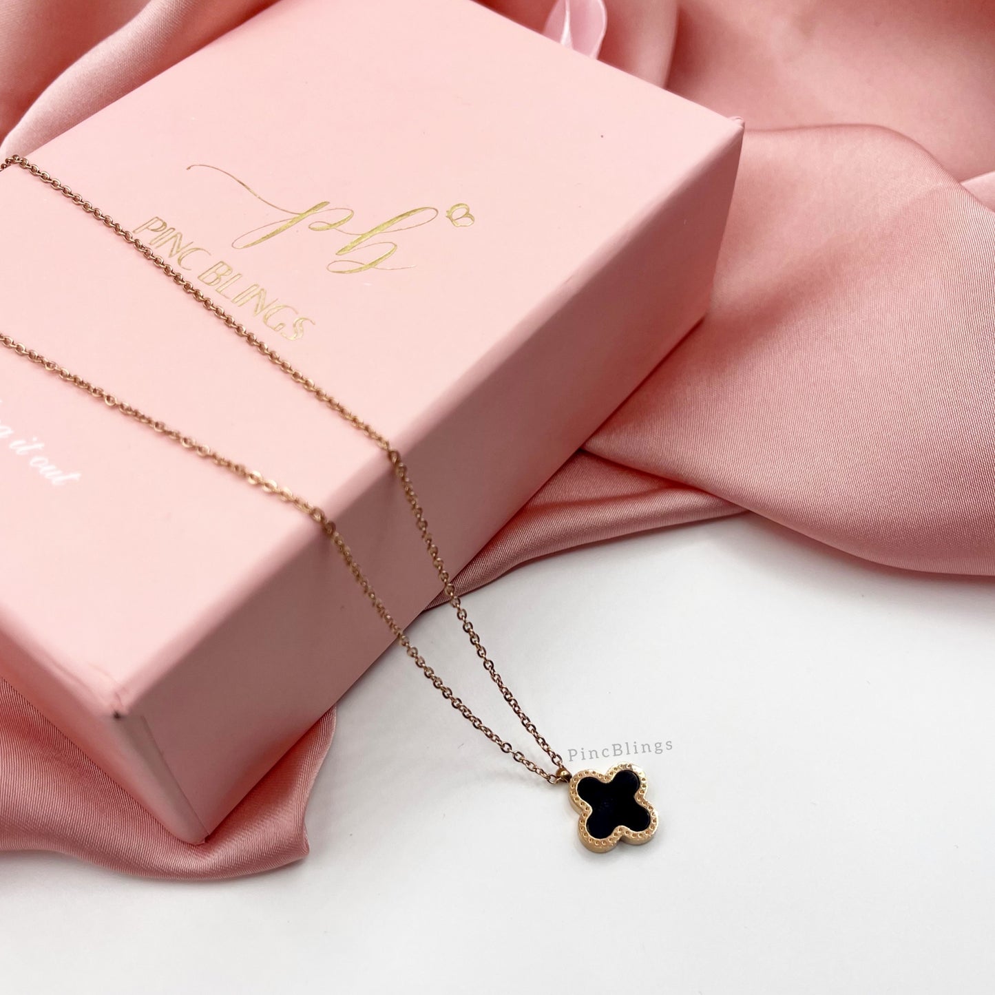 Black clover necklace