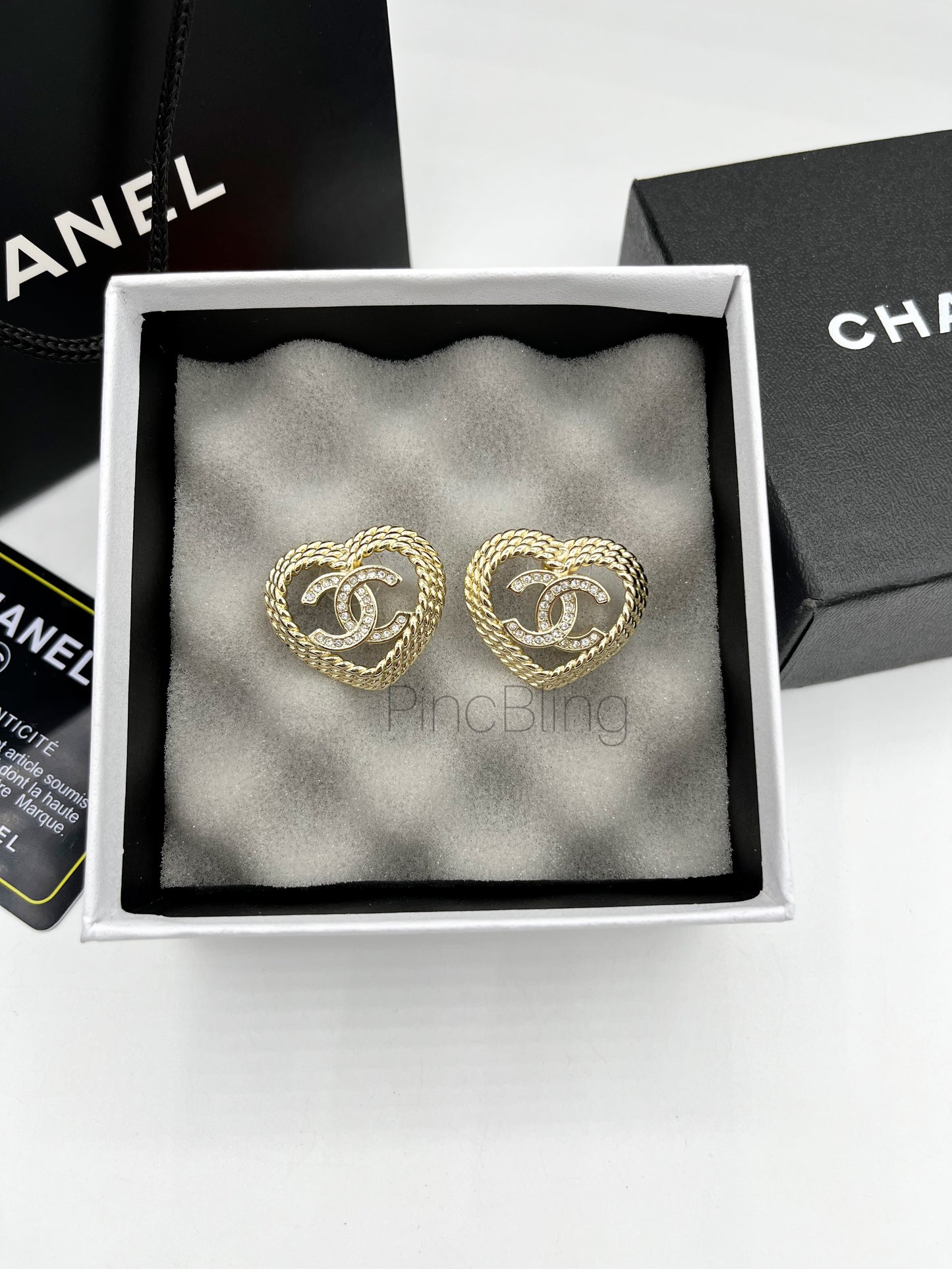 Fancy Heart branded earrings chnl