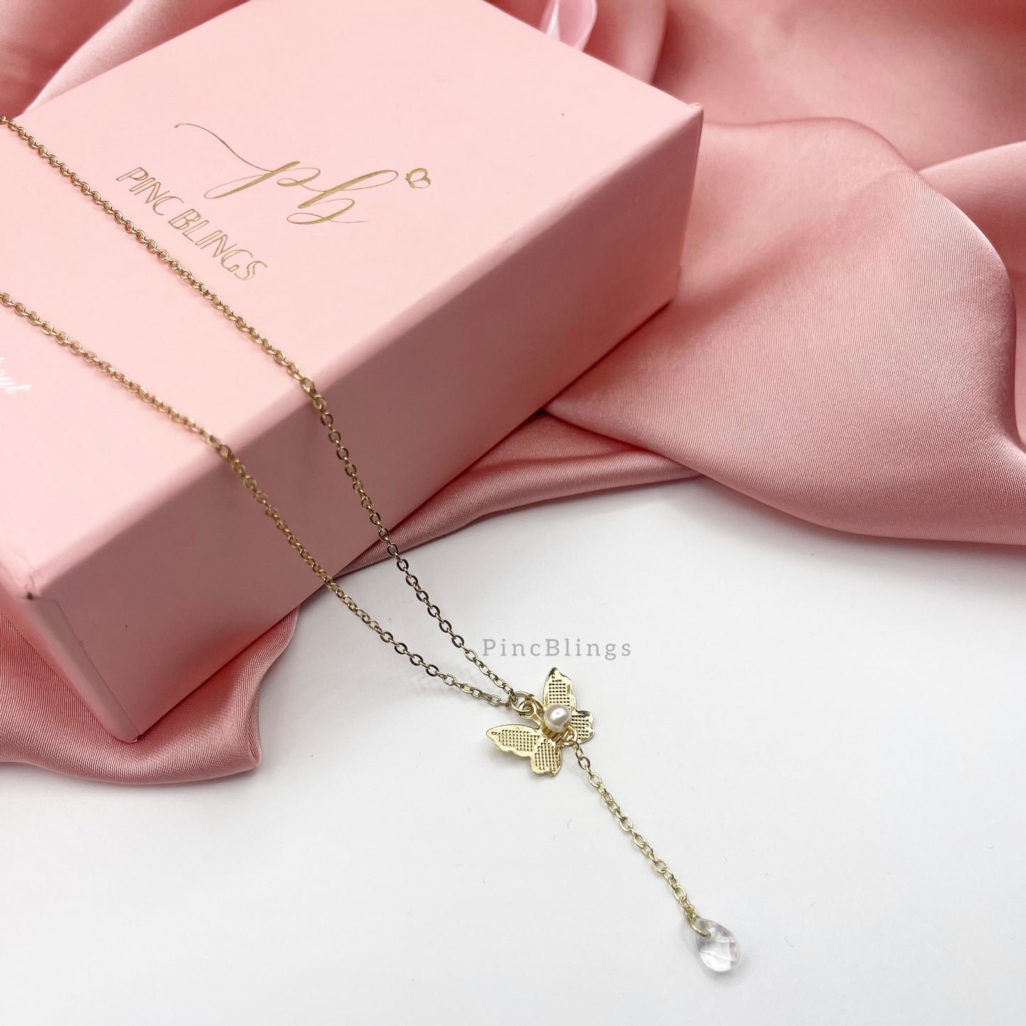 Small Butterfly necklace golden