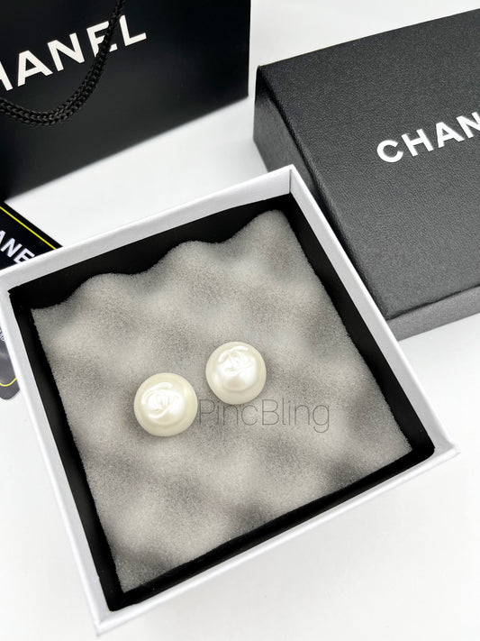 Pearl punched branded earrings chnl