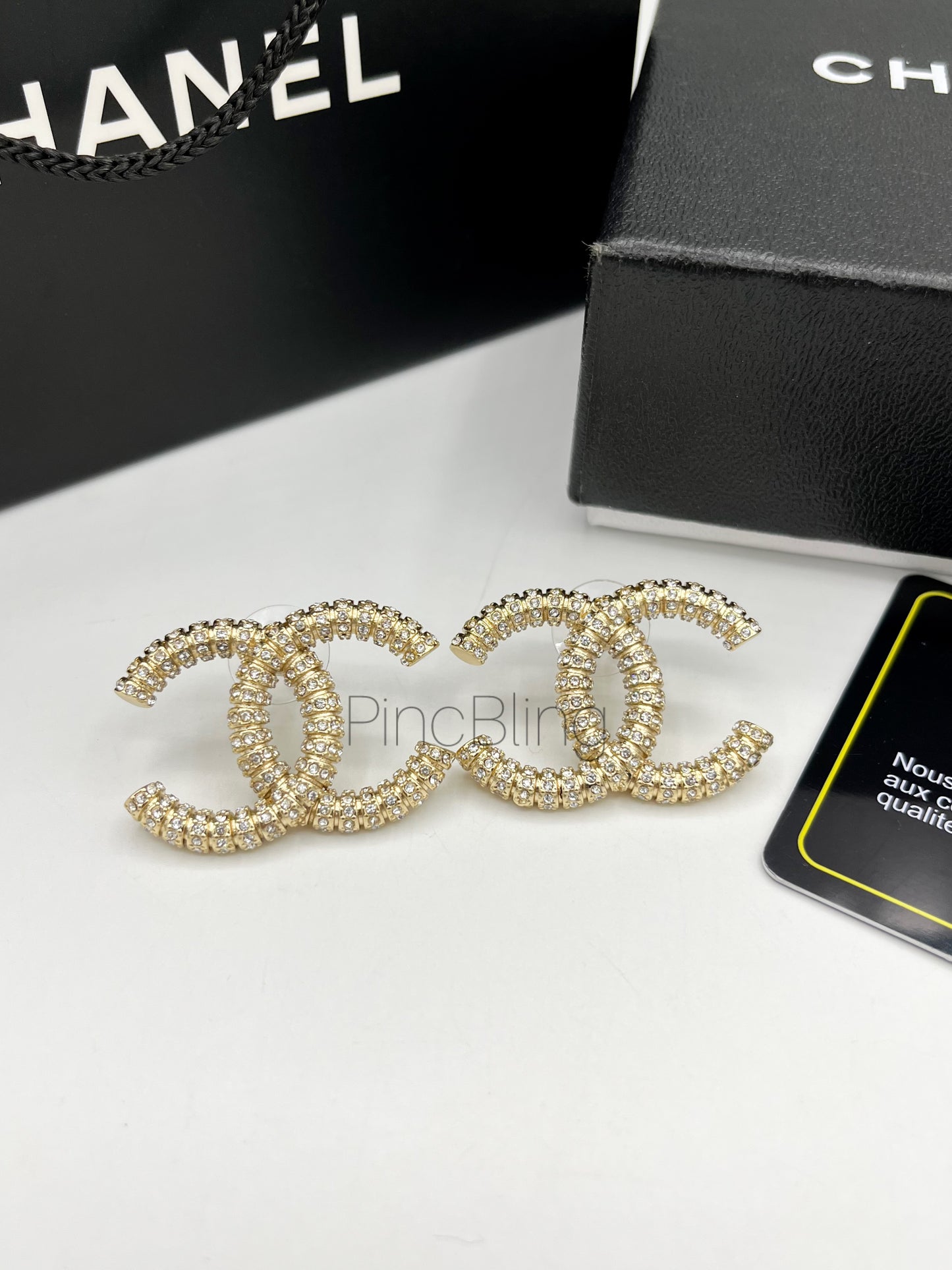 Sparke branded earrings chnl